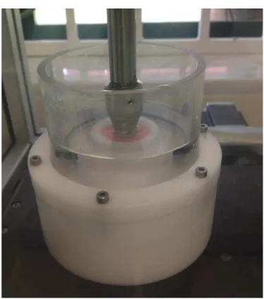 Figura 8. Imagem de uma das câmaras da  Chewing Simulator  com água destilada a 37º durante o  envelhecimento artificial de uma das amostras