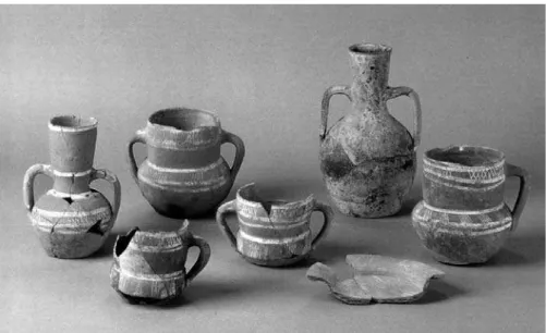 Fig. 3. Cerâmicas decoradas com pintura branca encontradas nas escavações do Castelo de  Mértola (séc