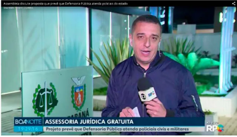 Figura 7. Repórter Marcelo Rocha usa jaqueta de nylon azul por cima de camisa social.