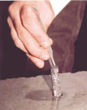 Figure 6 • Removing the drilled core In Its full 65 mm length.