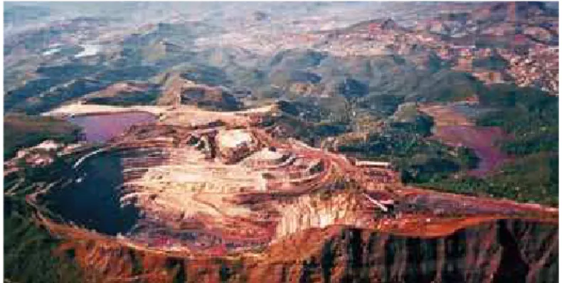 Figure 1 Aerial view, from 1998,  of the Águas Claras Mine from  the top of Curral Mountain