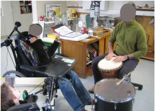Figure 9. DC using the first prototype with the help of the physiotherapist and in the presence of the engineering students (year 2008).