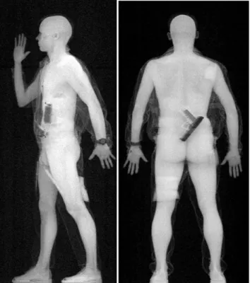 Figura 3: Pórticos detectores de metal. Os aparelhos metálicos aparecem escuros, quando vistos contra  o corpo