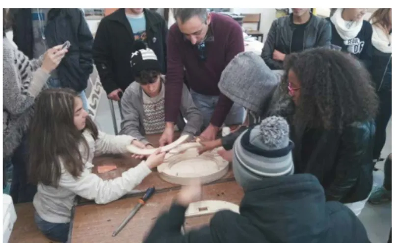Figure 3. Students and teachers assembling the stadium prototype, later called “Vfablab Arena” 