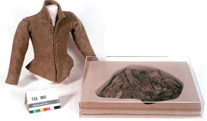 Figure 5 – The remains of a seventeenth century doublet, found in the Reigate Cache, in its storage-cum-display case and displayed alongside a modern replica (TCC 1851).