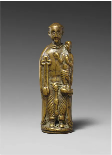Figure 7 − Saint Anthony igure. Kongo Kingdom, possibly 17th − 18th century. Brass, height: 10  cm