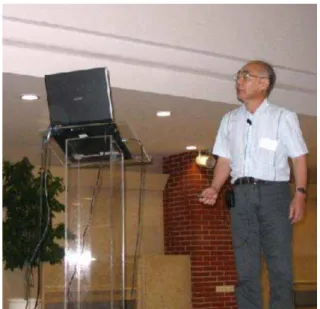 FIG. 20: Yogiro delivers the invited talk of the plenary session at QM05, Budapest.