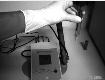 Figure 1. Falcon graded test tube with saliva supernatant.  Salivary pH  digital measuring method demonstration.