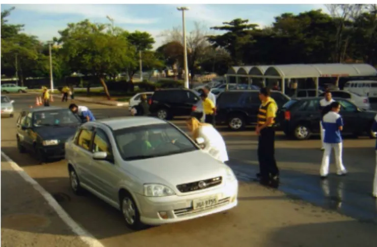 Fig. 5 – Information campaign among the population, at school gates, with traffic agents, who noted and gave advice regarding the correct use of CRDs and seat belts.