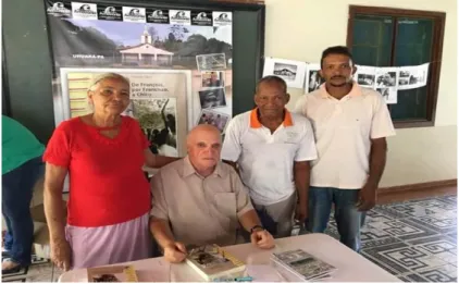 Figura 1. Casal Ramos, filho mais velho e o padre Chico no lançamento do livro, Uruará,  Pará