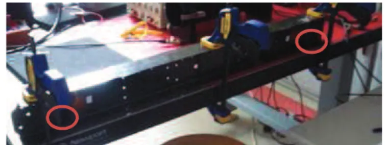 Figure 1 –  Instrumented composite stiffener in clamped configuration in the  laboratory 