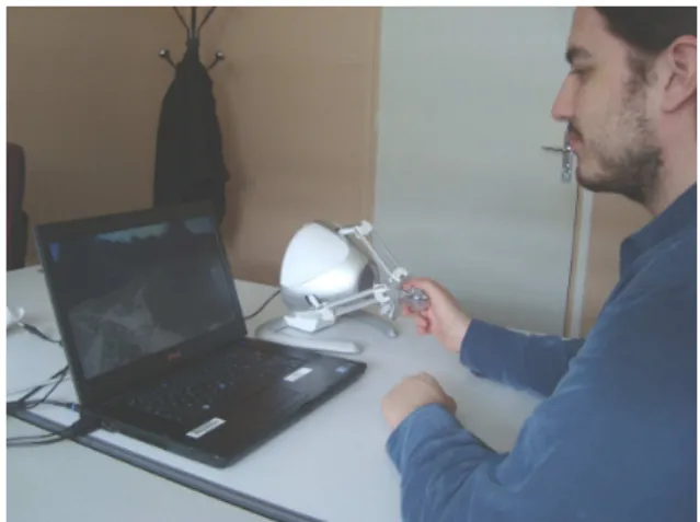 Figure 6: A participant experiences an audiovisual content enriched with haptic feedback.