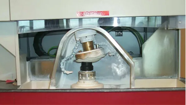 Figure I.14 : machine à commande numérique de polissage souple avec un polissoir à membrane élastique