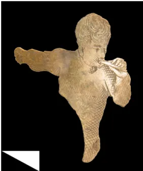 Fig. 6. Fragment of a bronze book casing with an engraved male figure, found at the wooden residence in Mazepa’s court in 2012
