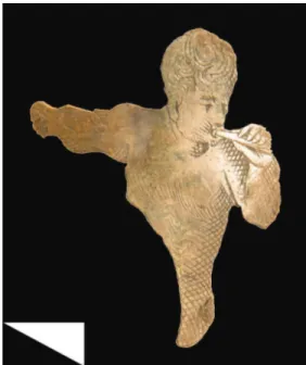 Fig. 6. Fragment of a bronze book casing with an engraved male figure, found at the wooden residence in Mazepa’s court in 2012