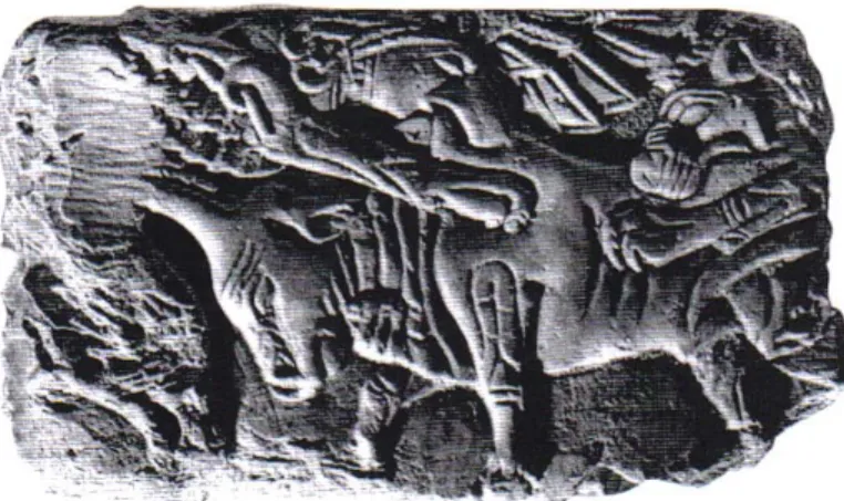 Figure 9: Ivoire, taureau attaqué par un griffon et un lion, Byblos.  