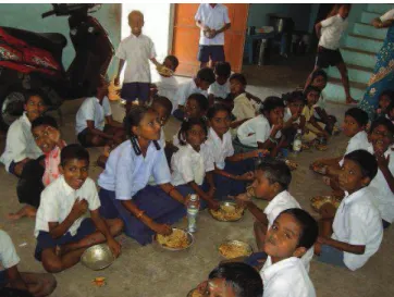 Figure 7 : Repas de midi dans une école privée subventionnée par le gouvernement  (Ecole St