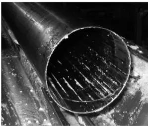 Fig. 6. Closed lower openings of the outer barrel after welding-in triangular metal pieces.