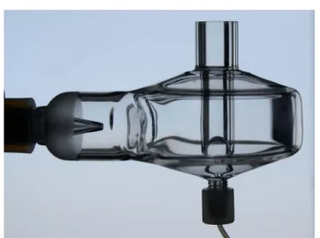 Fig. 1 Side view of the glass spray chamber equipped with the nebulizer.
