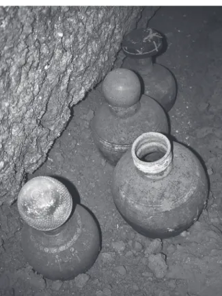 Fig. 5: Ceramic and bronze vessels associated with Individual 4.