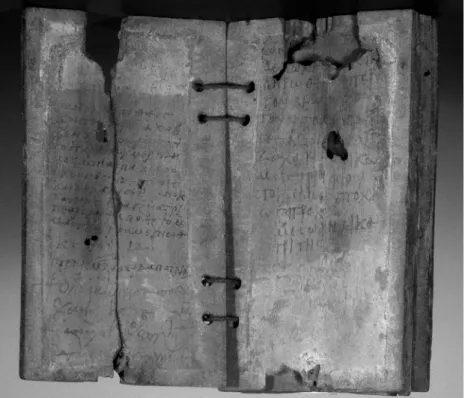 Figure 1 – Le codex Weill : un cahier de reçus fiscaux grecs (ici page de droite)   et coptes (page de gauche) du  VI e  siècle