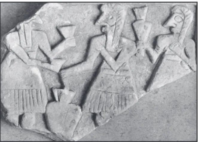 Fig. 1 - Relief de banquet. Plaque de Suse. 