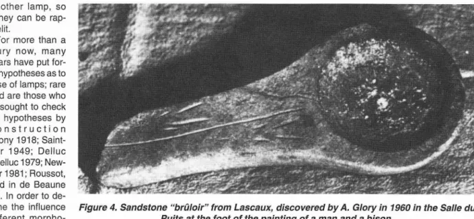 Figure  4.  Sandstone  &#34;brûloir&#34;  from  Lascaux,  discovered  by  A.  Glory  in  1960  in  the  Salle  du Puits  at  the  foot  of  the  painting  of  a  man  and  a  bison.