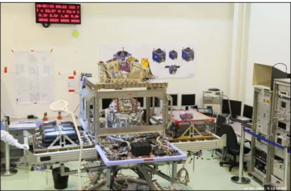 Figure 2. (© AIT-CNES Y. Le Deu ff ). The MICROSCOPE satellite being integrated. This is a space laboratory of about 300 kg