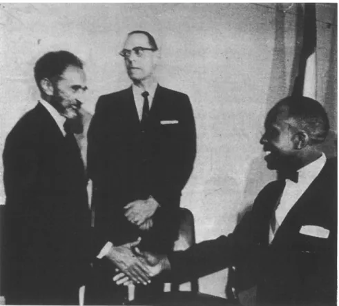 figure 1 Haile Selassie i and Reverend Evans shaking hands in Washington, d.c.