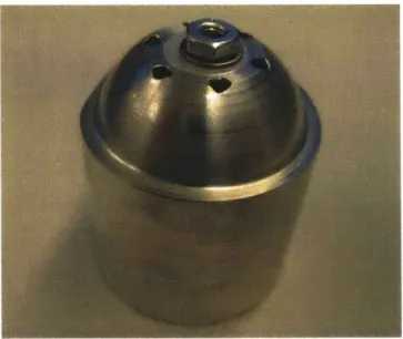 Figure  3-16:  Machined  spherical  target  sitting  on  its  partially  turned  fixture.