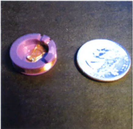 Figure  3.8  A  Zowie  LC  radio  fre- fre-quency  tag.  US  Quarter  shown  for size.