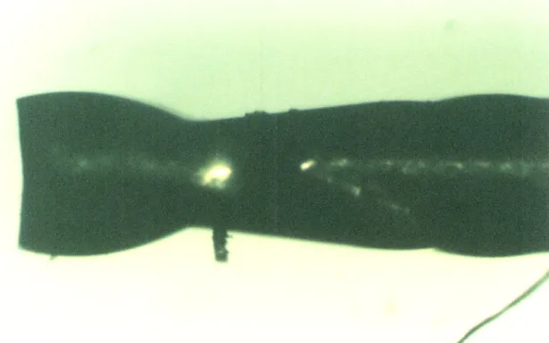 Figure  4.7:  Tool  C,  a 0.015"  diameter endmill,  imaged  under  optical microscope.