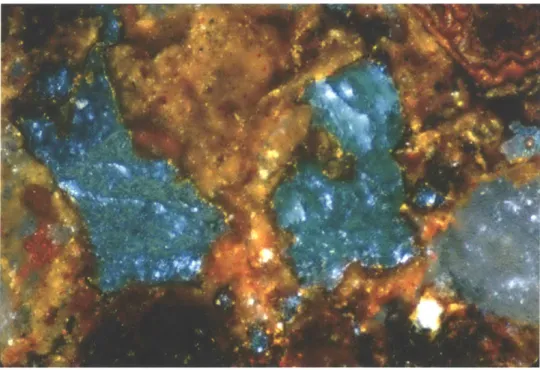Figure  13. Ore 4-13:  Thin  section  micrograph of red-  and green-colored  minerals under cross  polarization  (50x).