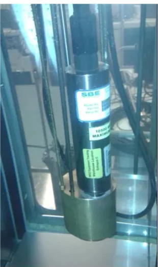 Figure 4. SBE3, SBE35 (not visible), and two reference SPRTs mounted in the brass comparator  block of the sub-millikelvin calibration facility