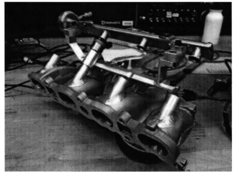 Figure  3-1:  LNF  Ecotec  manifold  with  welded  bosses  to  mate  PFI  injectors  with  the