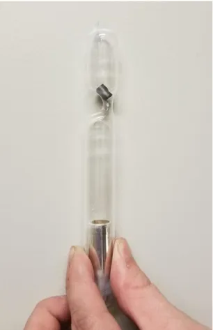 Figure  11.  Image  of  silver  crucible  sealed  with  a  piece  of  carbon  in  a  quartz  tube