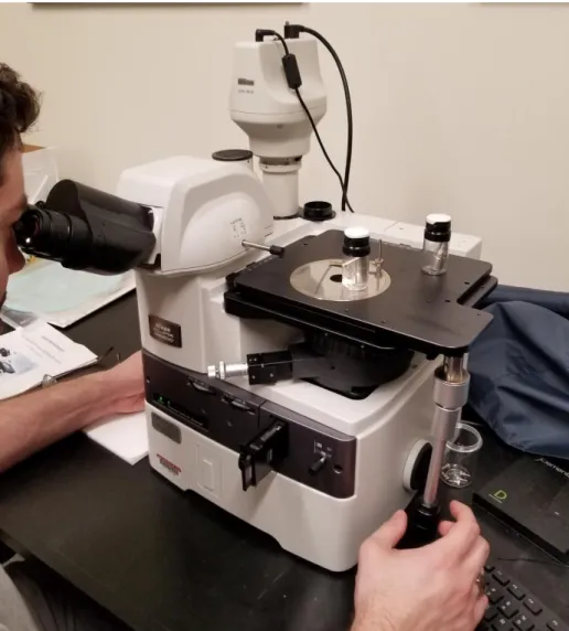 Figure 12. Due to the inverted configuration of this microscope, containment of samples within  plastic vials was a simple and effective method for performing this method of characterization