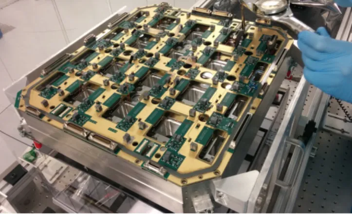 Figure 4. Rear view of the vacuum interface board during cryostat assembly. The vacuum gasket and connectors are visible around the perimeter