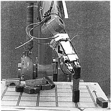 Figure  2-6:  Here  is  Perth  placing  a  block  under  command  of the  author.