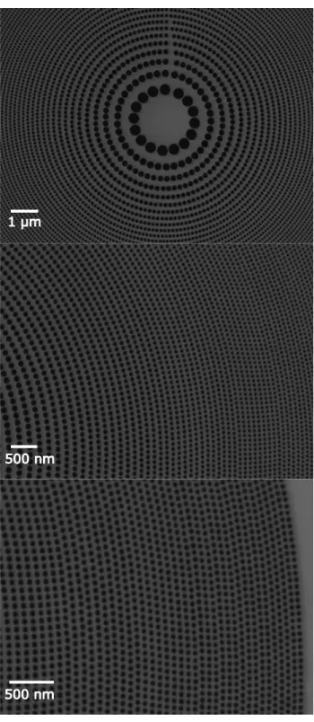 FIG. 4. Close-up SEM images of a free-standing atom sieve. The holes of the innermost zone have a diameter of 378 nm ± 4 nm, and the holes of the outermost zone are found to be 38 nm ± 4 nm.