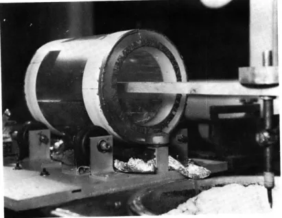 Fig.  VII-Z.  Fused  quartz  cavity  in  process  of  being  ground.