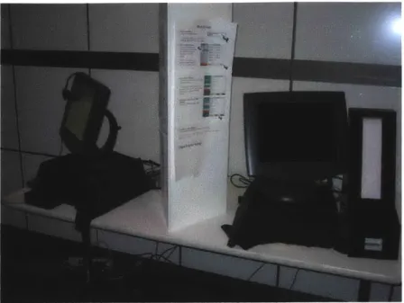 Figure 9:  Voting booths set up with a separating divider.