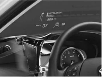 Figure 2.6: ‘Optical See-Through’ AR display on the windshield of a car (Narzt et al., 2005) 