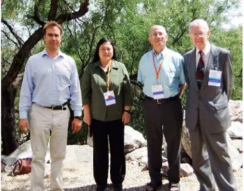 Fig. 11. (Color online) Manufacturing Problem team (left to right): David Allan, Li Li, Michael Jacobson, and George Dobrowolski