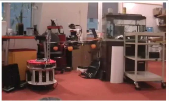 Figure 1-7: A photo of our vehicle flying autonomously in an unstructured indoor environ- environ-ment