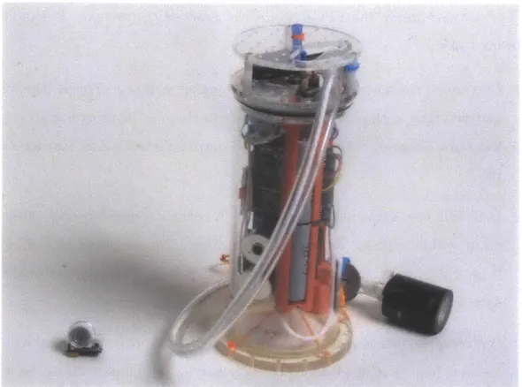 Figure  3-10:  AquaOptical  Micro  modem  (left)  next  to  a  31  cm  high  AquaNode  into which  it can  be  integrate.