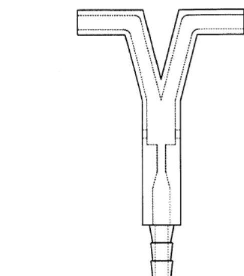 Figure  1-2:  Water  enters  the  device  through  the bottom  nozzle.  By  covering  the  gaps on  either  side  of the  body  of the  device  the  water  can  be  directed  out  of  the  opposite exit  port