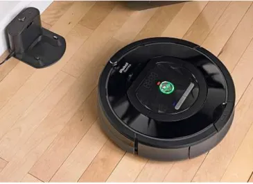 Fig. 1. iRobot’s Roomba and its charging station 1 .