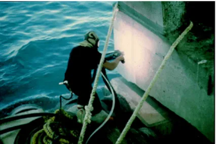 Figure 3.Arc spraying of zinc on a concrete bridge pier in the Florida Keys. In this case the zinc  acts as sacrificial anode, although it is more frequently used in impressed-current systems