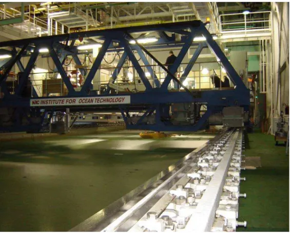 Fig. 13 The Terry Fox as it starts to proceed down the tank in the initial ice  sheet test in a path controlled by the PMM 